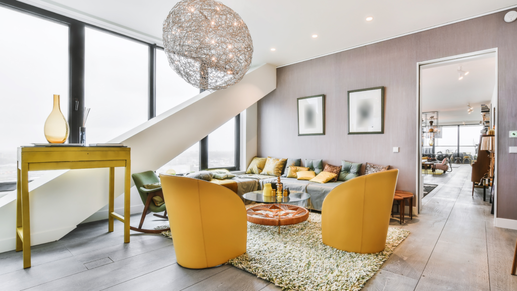 Unique styled living room with lively colored furniture accent